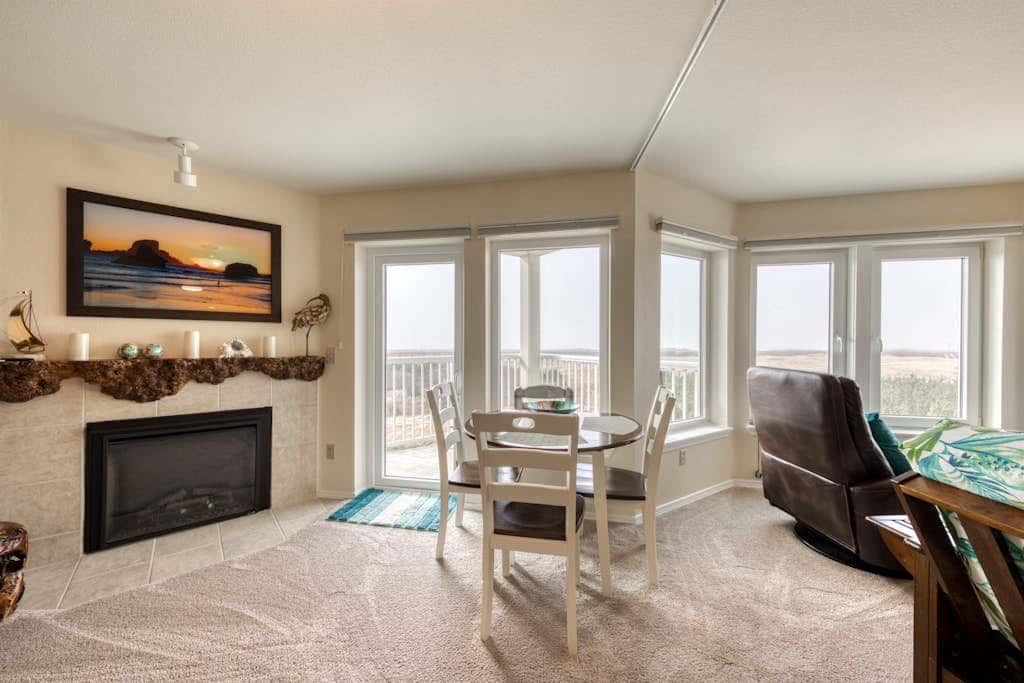 Dog-friendly oceanfront condo with electric fireplace - walk to the beach