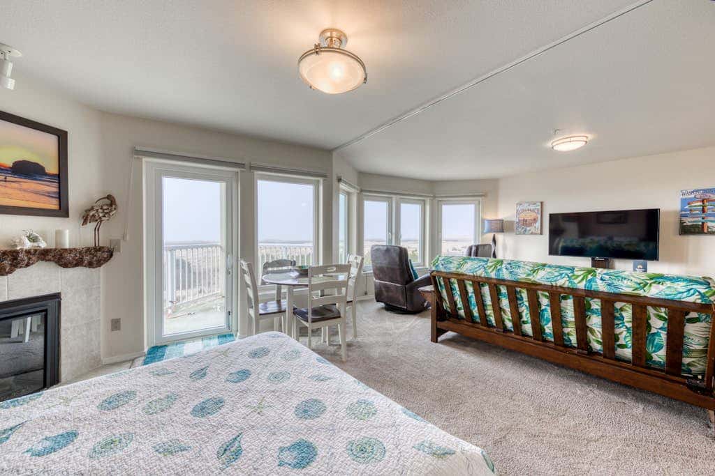 Dog-friendly oceanfront condo with electric fireplace - walk to the beach
