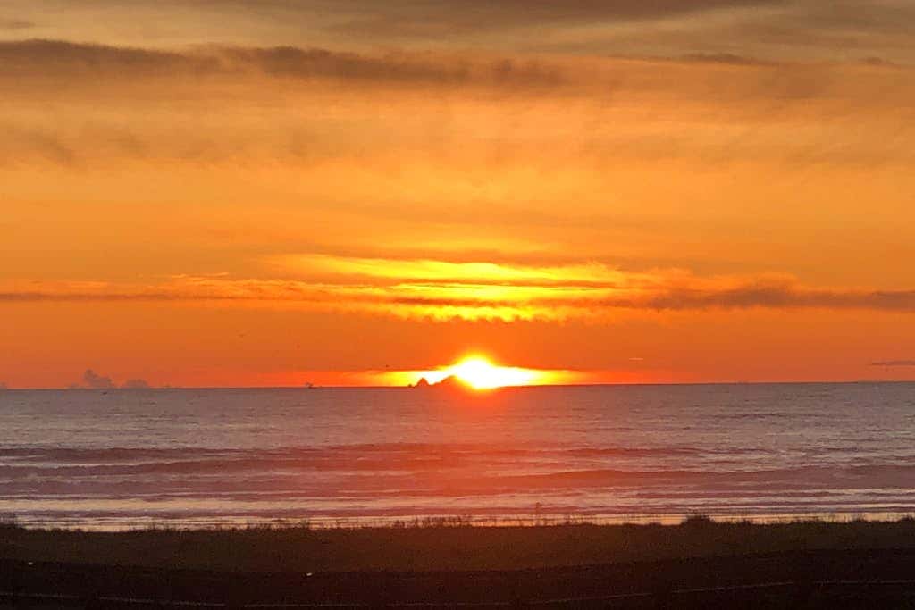 Dog-friendly oceanfront condo with electric fireplace - walk to the beach