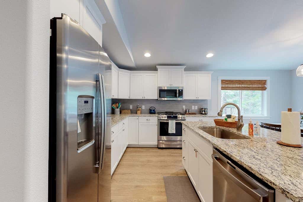 Brand-new home with hot tub, deck, fast WiFi, central AC, & great location