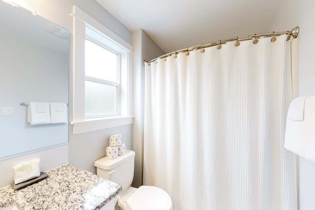 Brand-new home with hot tub, deck, fast WiFi, central AC, & great location