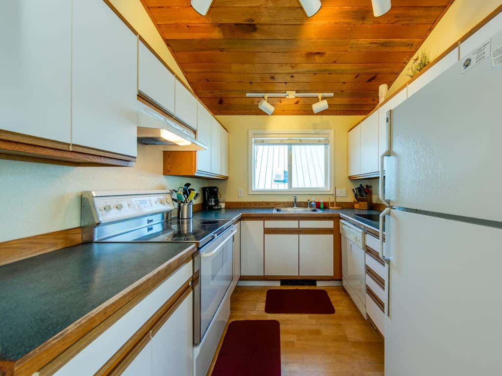 2-story dog-friendly home with beach access, Ping-Pong table, & grill