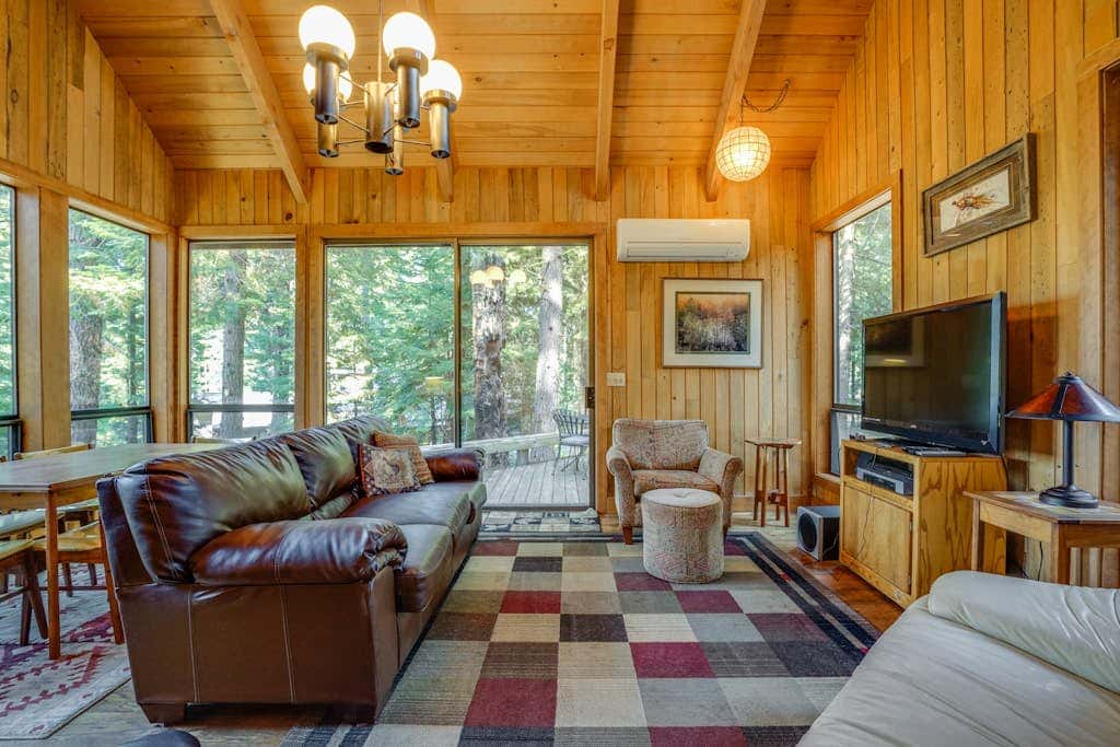 Dog-friendly cabin with deck, mountain views, pools, & hot tubs