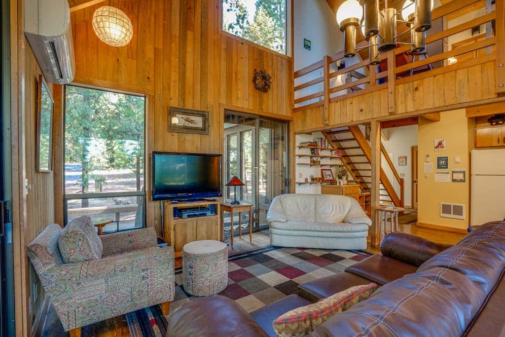 Dog-friendly cabin with deck, mountain views, pools, & hot tubs