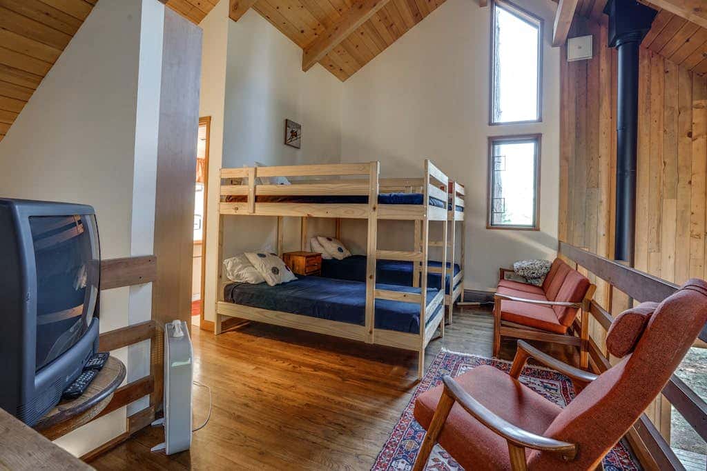 Dog-friendly cabin with deck, mountain views, pools, & hot tubs