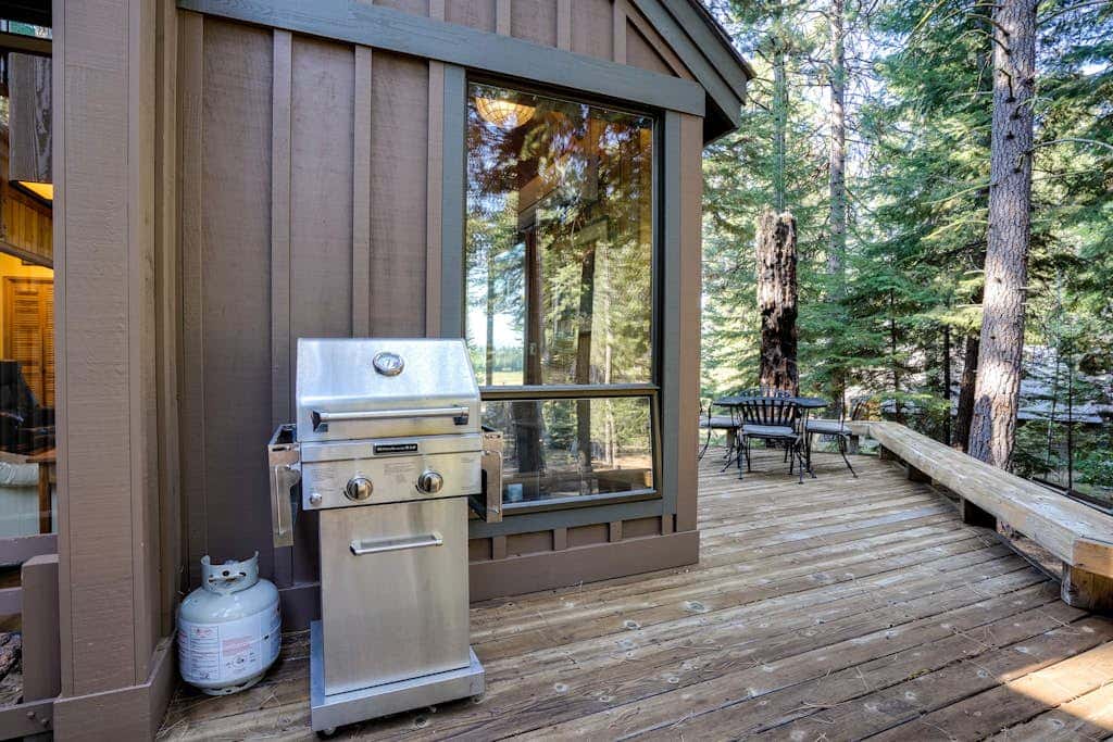 Dog-friendly cabin with deck, mountain views, pools, & hot tubs
