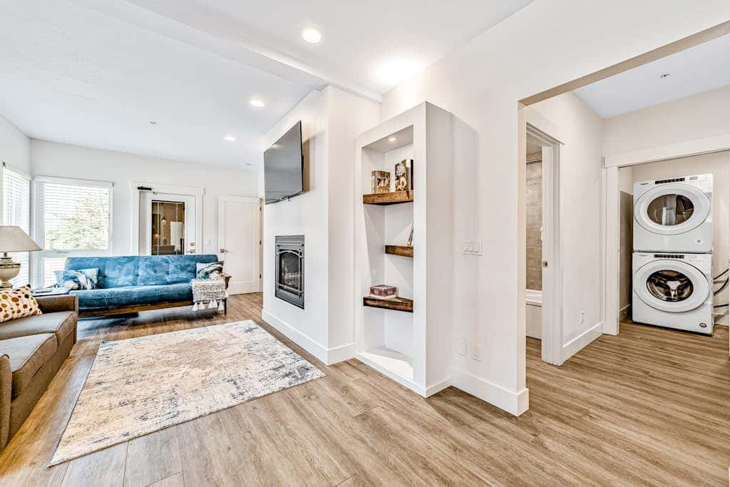 Sunny apt with fireplace, partial water views, washer/dryer, grill & AC