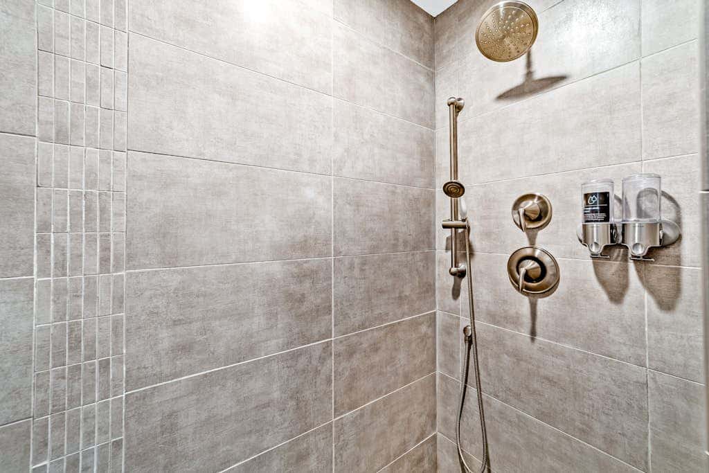 Sunny apt with fireplace, partial water views, washer/dryer, grill & AC
