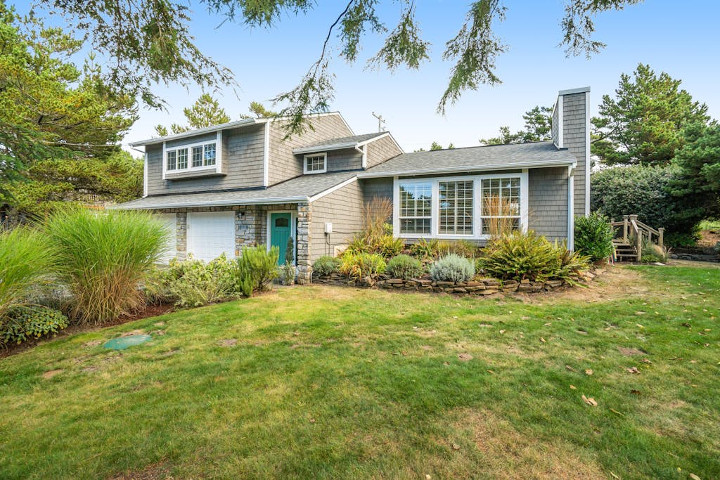 Newly updated, dog-friendly house near the beach with hot tub & grill