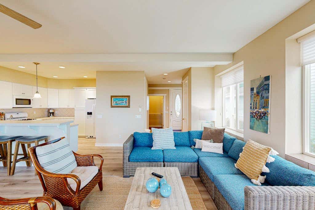 Modern oceanfront home with private hot tub, patio, & gas fireplace