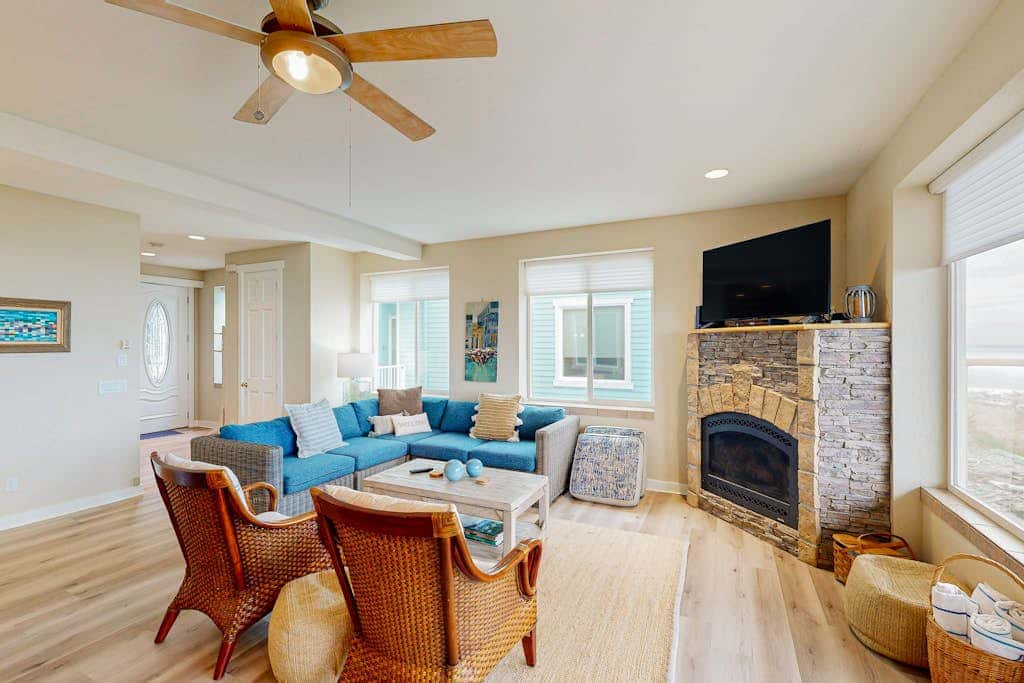 Modern oceanfront home with private hot tub, patio, & gas fireplace