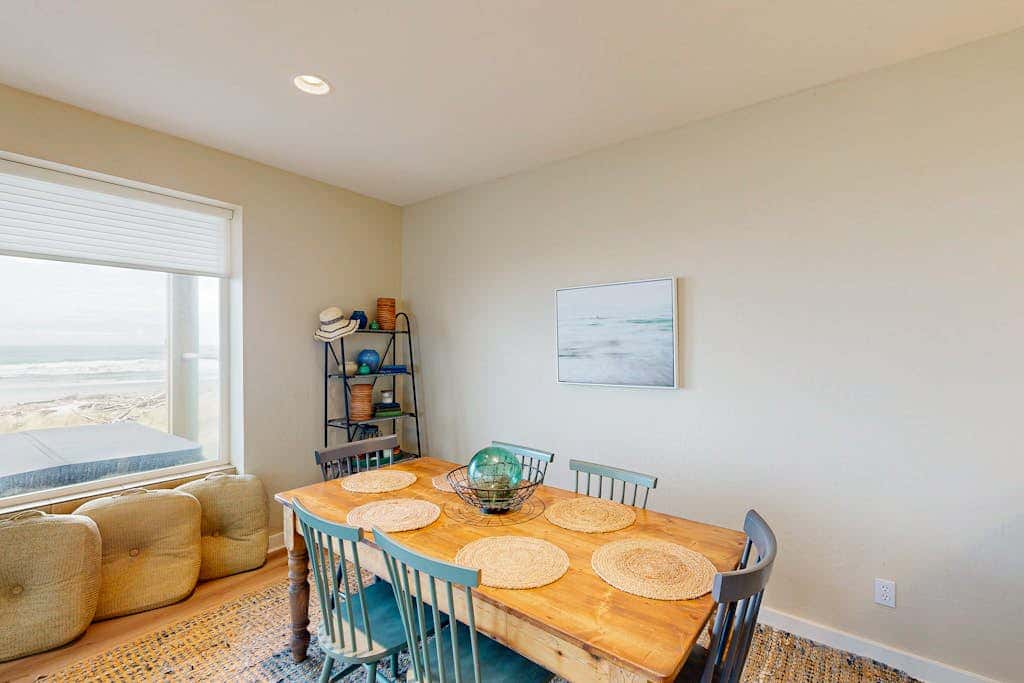 Modern oceanfront home with private hot tub, patio, & gas fireplace