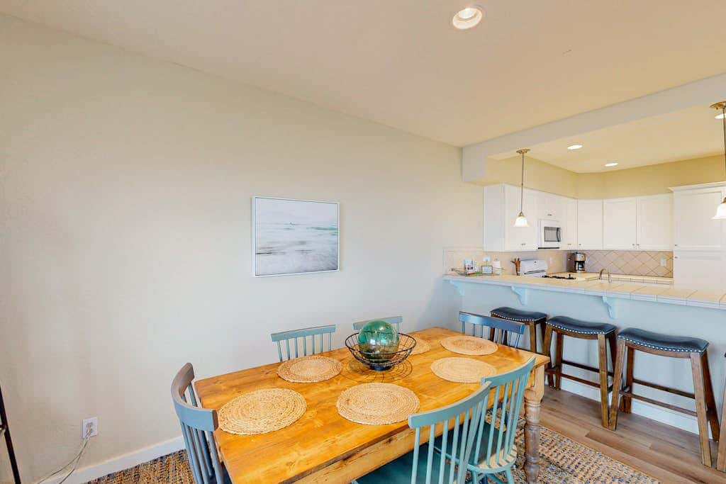 Modern oceanfront home with private hot tub, patio, & gas fireplace