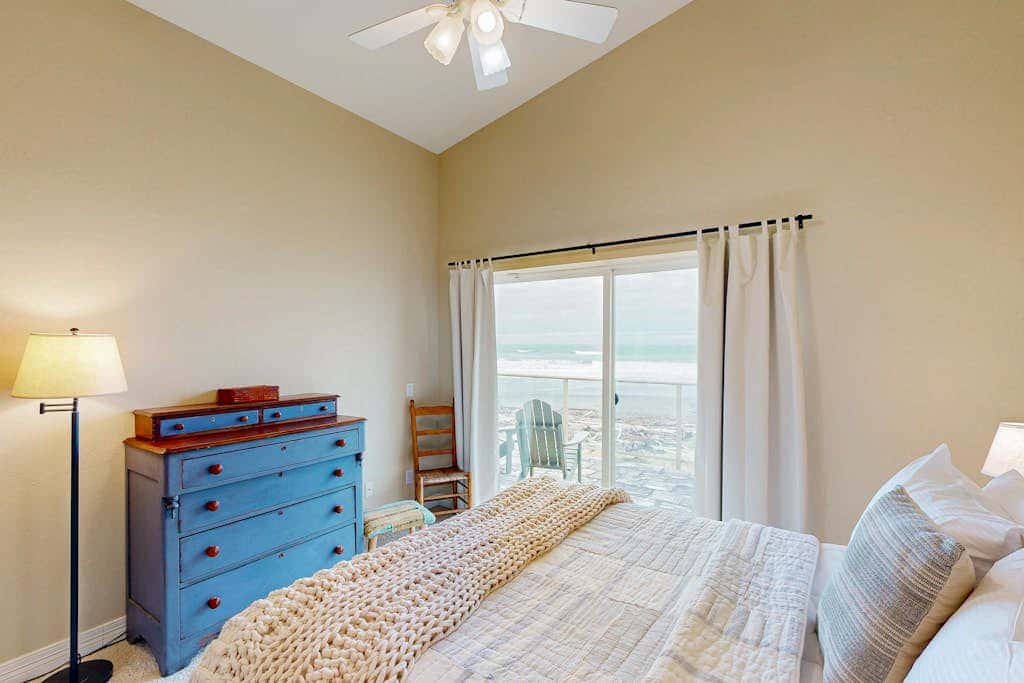 Modern oceanfront home with private hot tub, patio, & gas fireplace