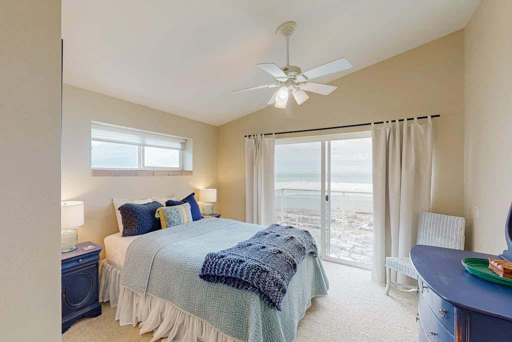 Modern oceanfront home with private hot tub, patio, & gas fireplace