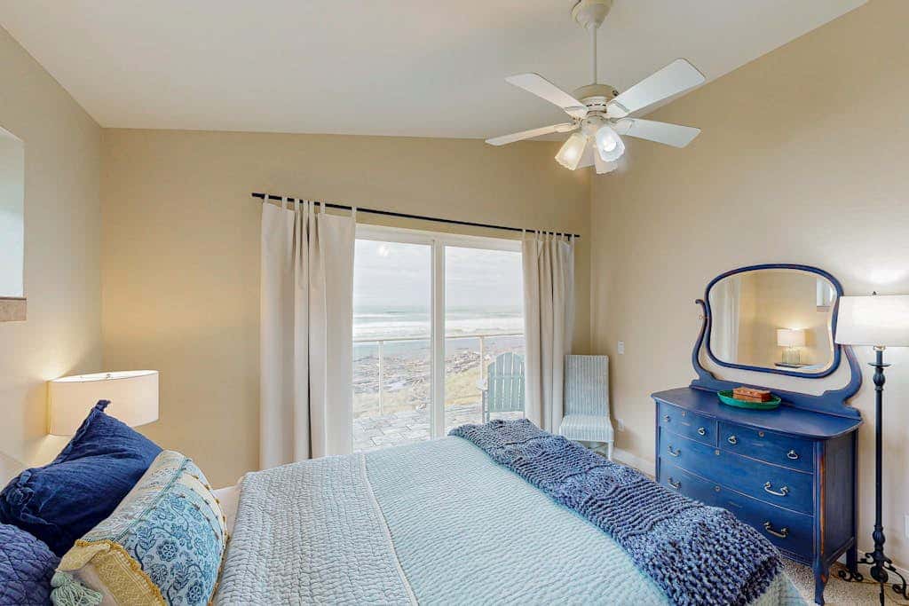 Modern oceanfront home with private hot tub, patio, & gas fireplace