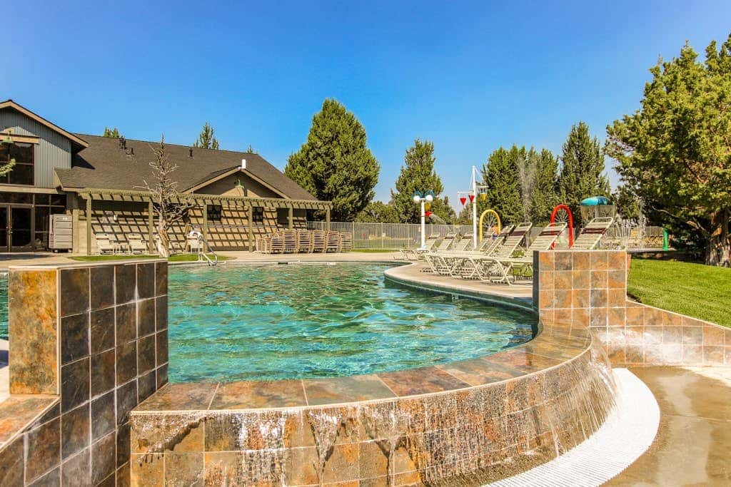 Dog-friendly townhome with mountain views, pools, hot tubs, fitness room, & W&D