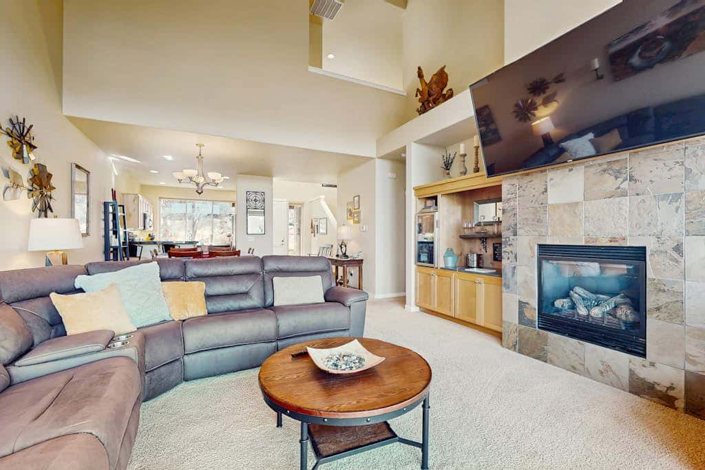 Dog-friendly townhome with mountain views, pools, hot tubs, fitness room, & W&D