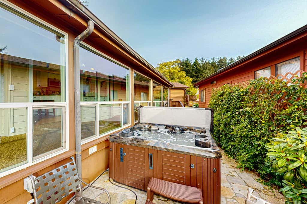 Oceanfront home with private hot tub, walls of glass & spectacular view