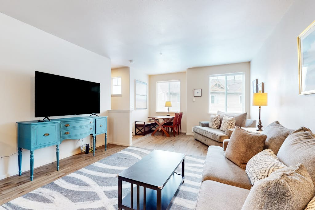 Dog-friendly condo with river views, private W&D, full kitchen, & great location