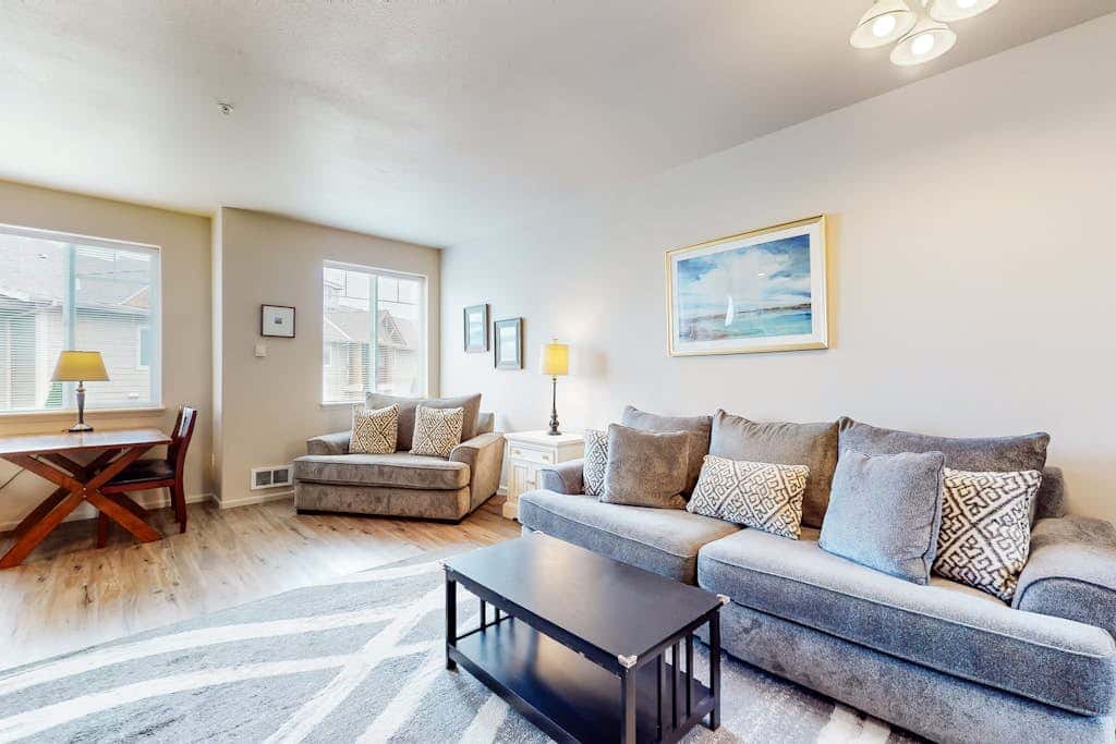 Dog-friendly condo with river views, private W&D, full kitchen, & great location