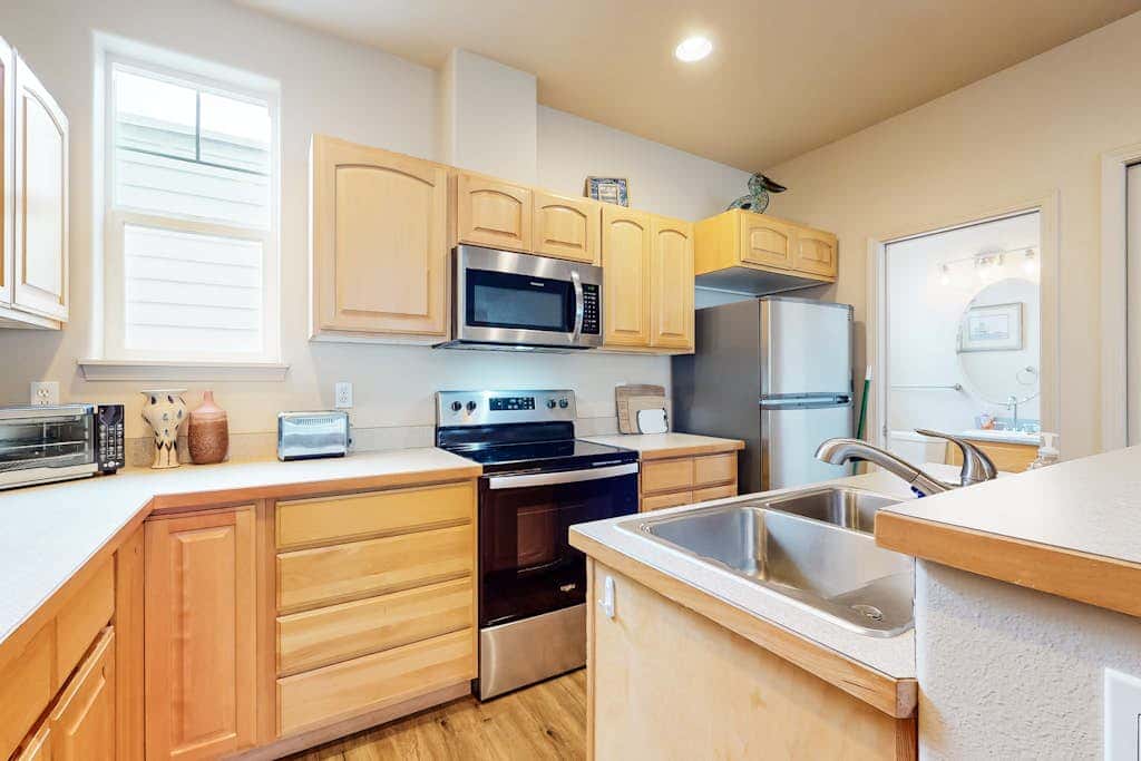 Dog-friendly condo with river views, private W&D, full kitchen, & great location