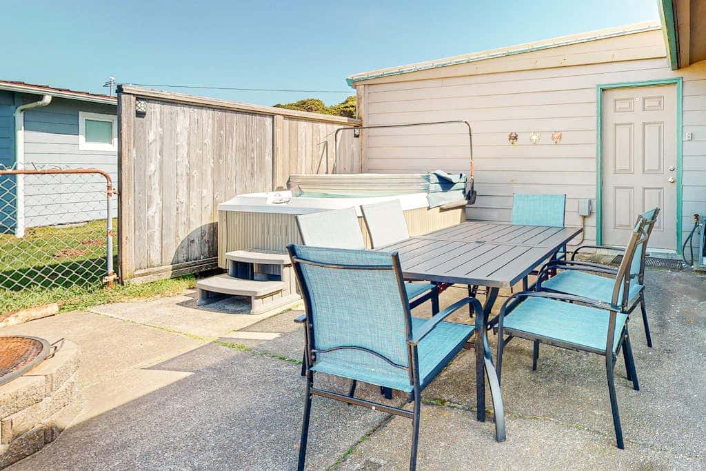 Dog-friendly oceanfront beach home with private hot tub and stunning ocean views