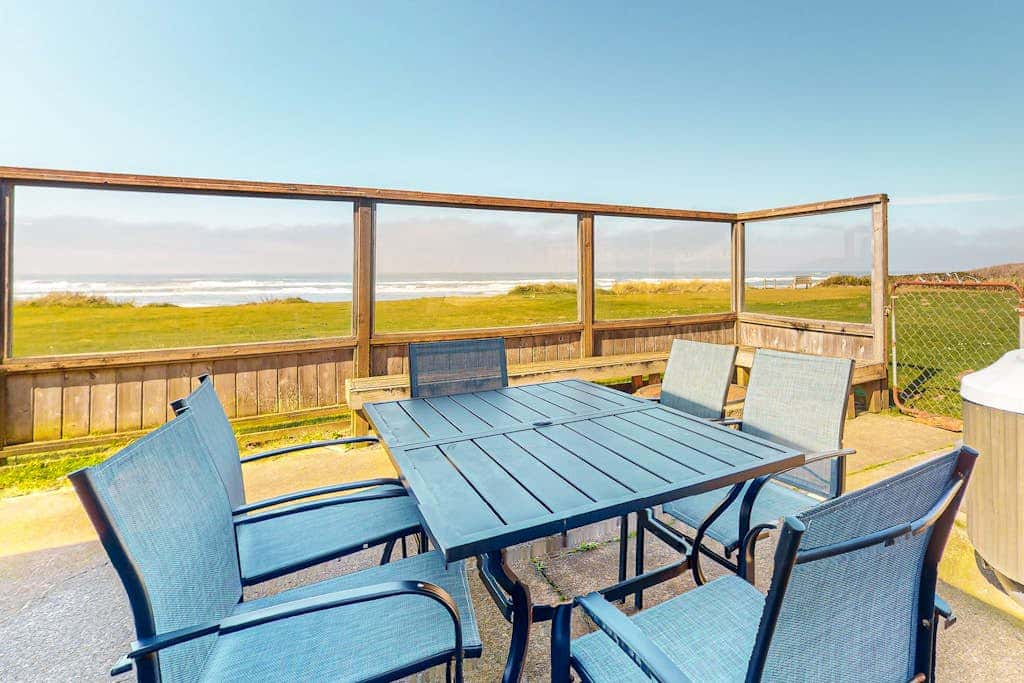 Dog-friendly oceanfront beach home with private hot tub and stunning ocean views