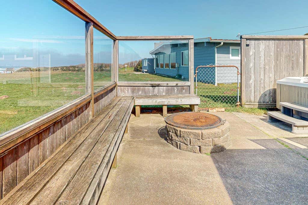 Dog-friendly oceanfront beach home with private hot tub and stunning ocean views