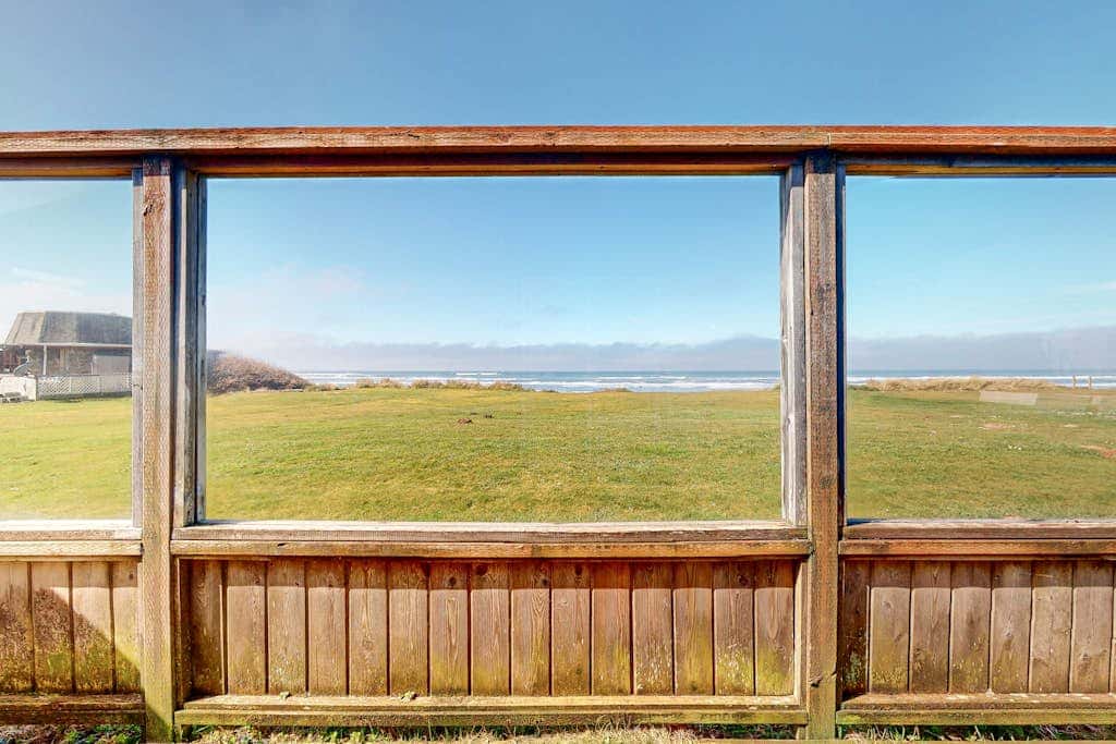 Dog-friendly oceanfront beach home with private hot tub and stunning ocean views