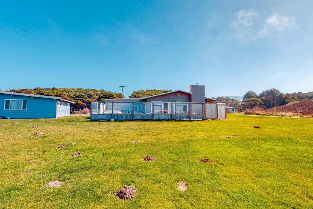 Dog-friendly oceanfront beach home with private hot tub and stunning ocean views