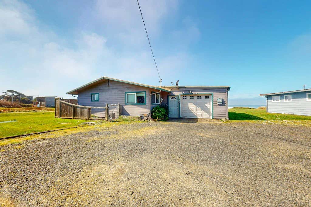 Dog-friendly oceanfront beach home with private hot tub and stunning ocean views