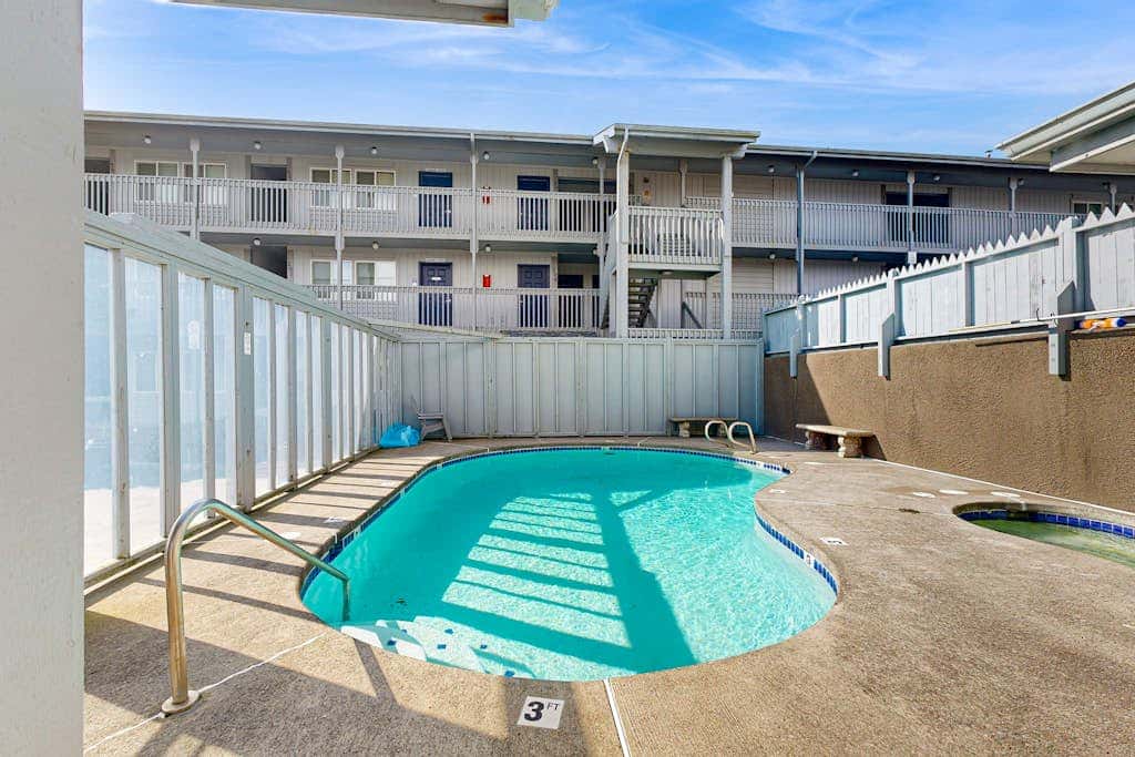Stylish Escape with Shared Pool, Direct Beach Access, Private Balcony & Ocean View
