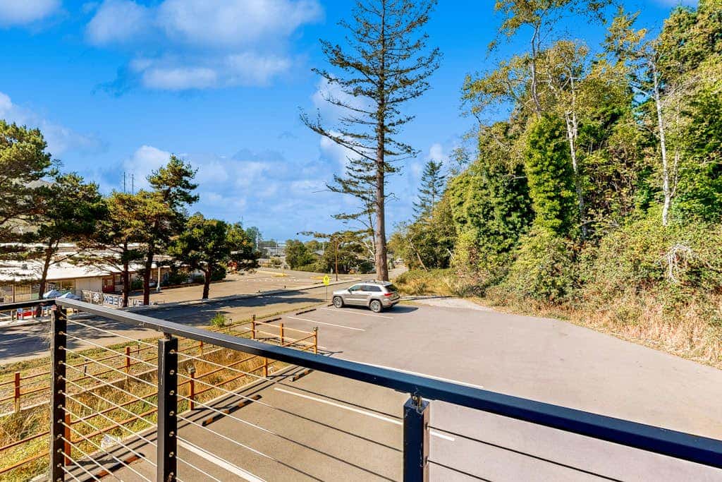 Sunny apartments with fireplace, partial ocean views, washer&dryer, grill & AC