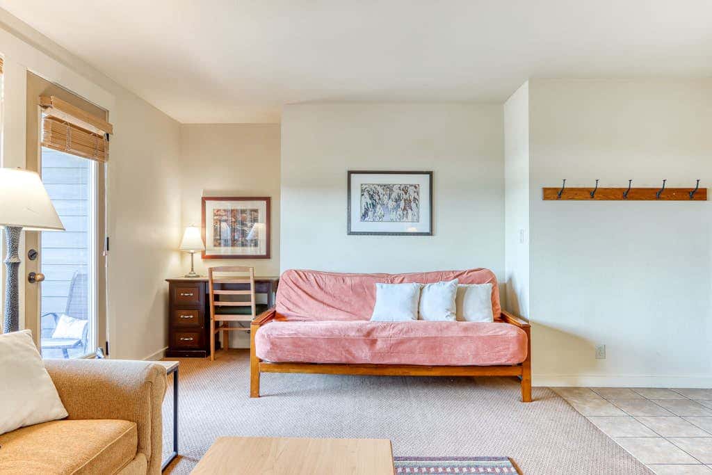 Third-floor retreat with treetop views, AC, pools, hot tubs, & sports courts