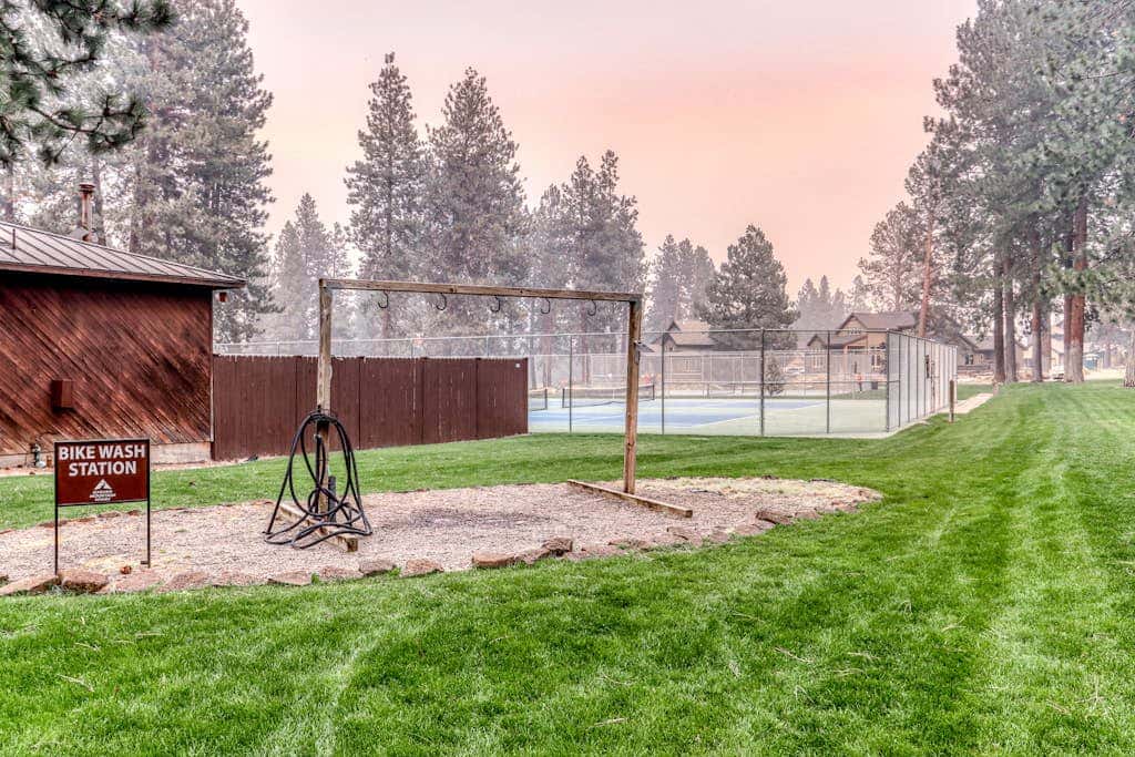 Third-floor retreat with treetop views, AC, pools, hot tubs, & sports courts