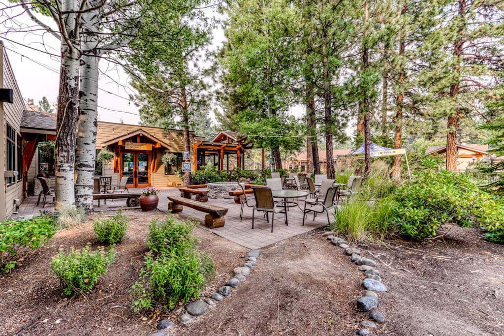 Third-floor retreat with treetop views, AC, pools, hot tubs, & sports courts