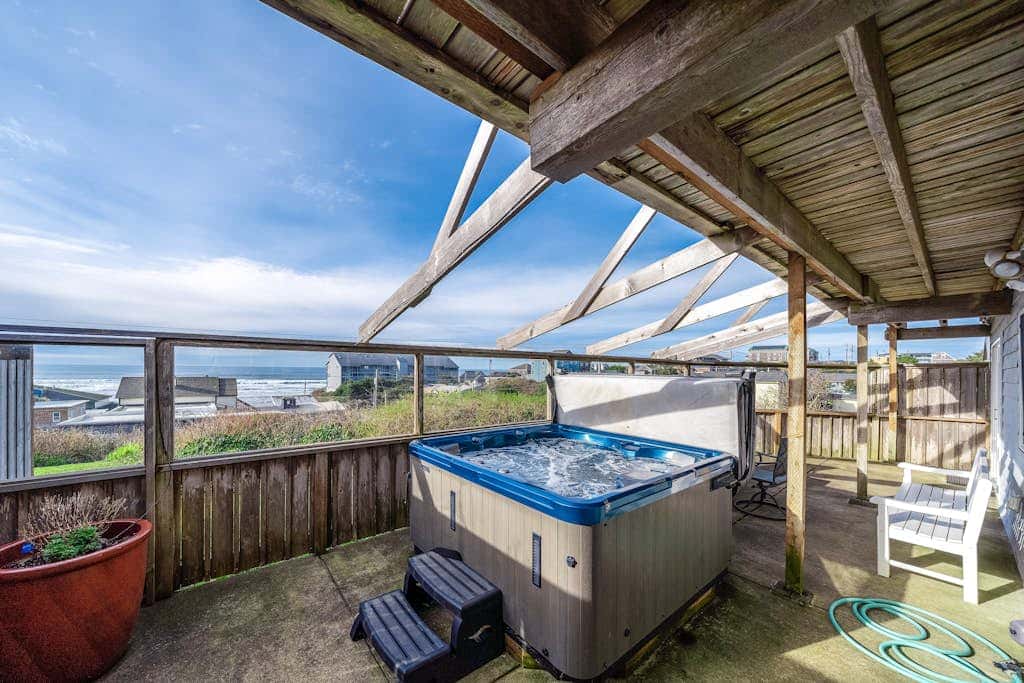 Dreamy Coastal Gem Near the Beach with Ocean View, Game Room, & a Private Hot Tub