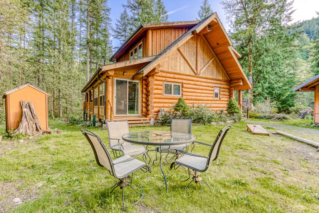 Woodland home near golf & ski slopes with wraparound deck - dog-friendly
