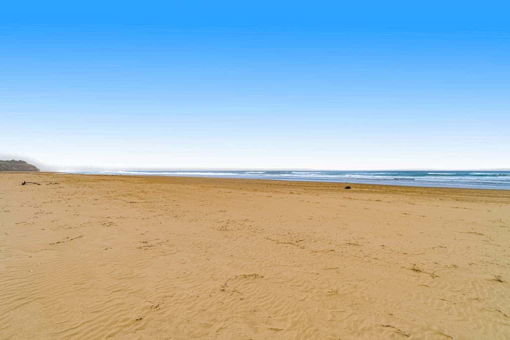 Spacious oceanfront home with free WiFi, and wrap-around deck