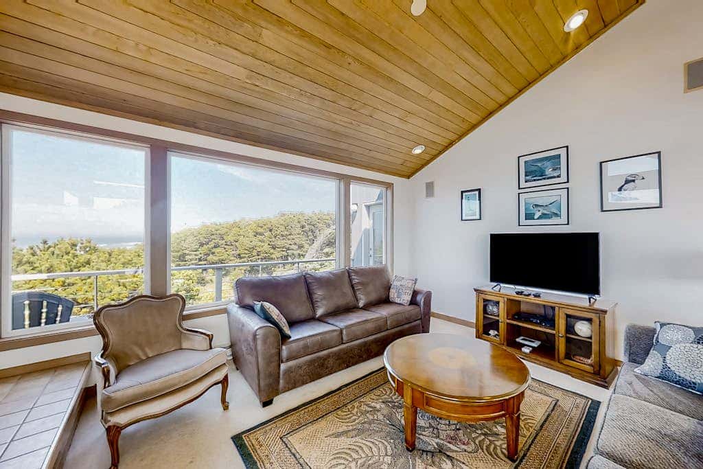Spacious oceanfront home with free WiFi, and wrap-around deck