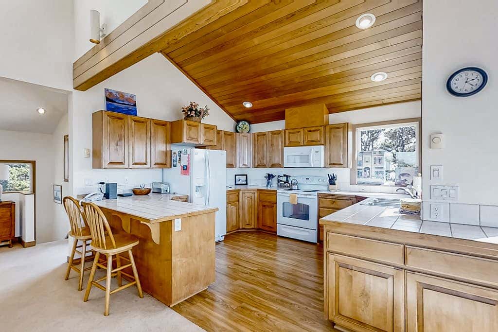 Spacious oceanfront home with free WiFi, and wrap-around deck