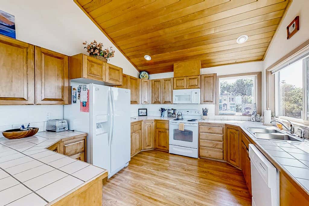 Spacious oceanfront home with free WiFi, and wrap-around deck