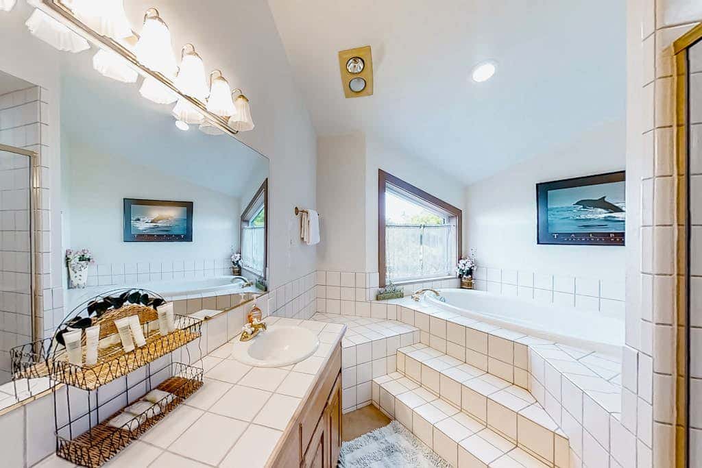 Spacious oceanfront home with free WiFi, and wrap-around deck