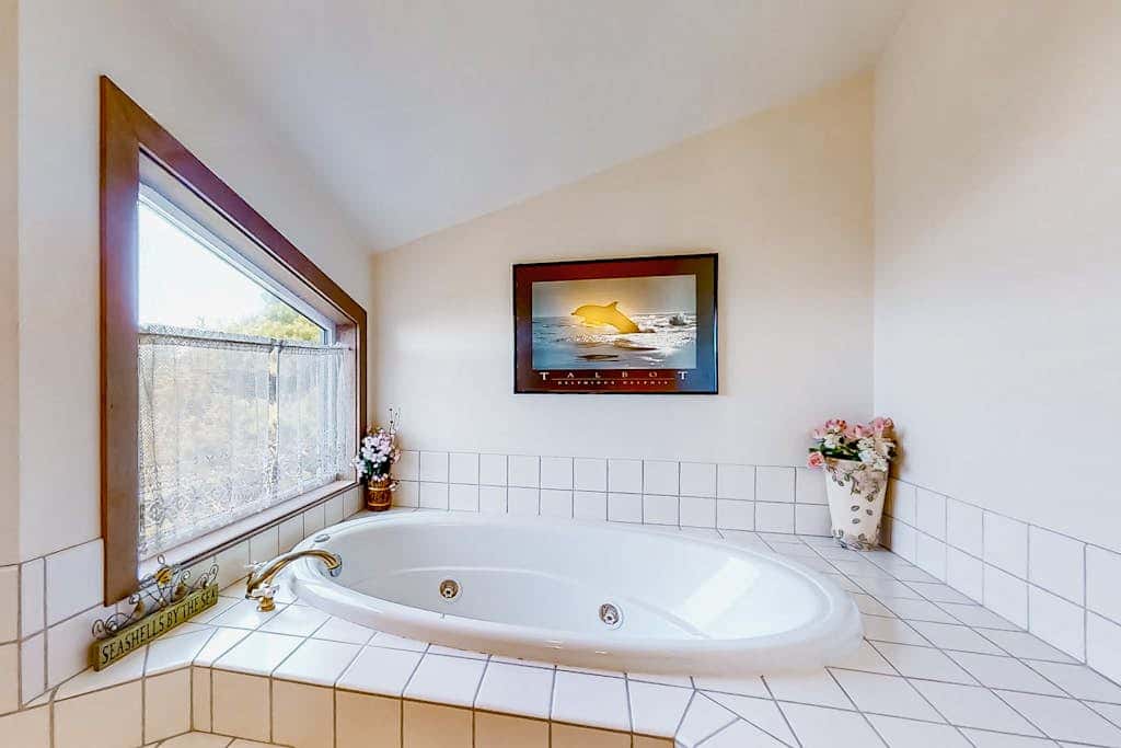 Spacious oceanfront home with free WiFi, and wrap-around deck