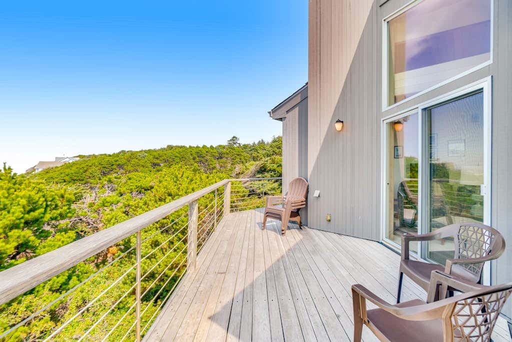 Spacious oceanfront home with free WiFi, and wrap-around deck