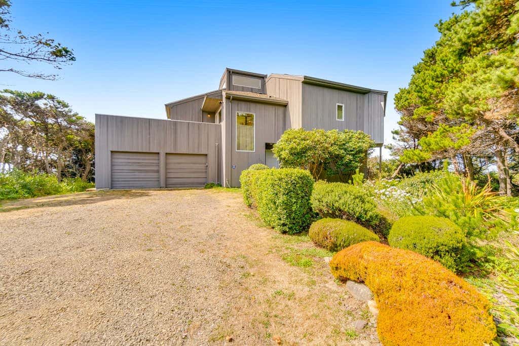 Spacious oceanfront home with free WiFi, and wrap-around deck
