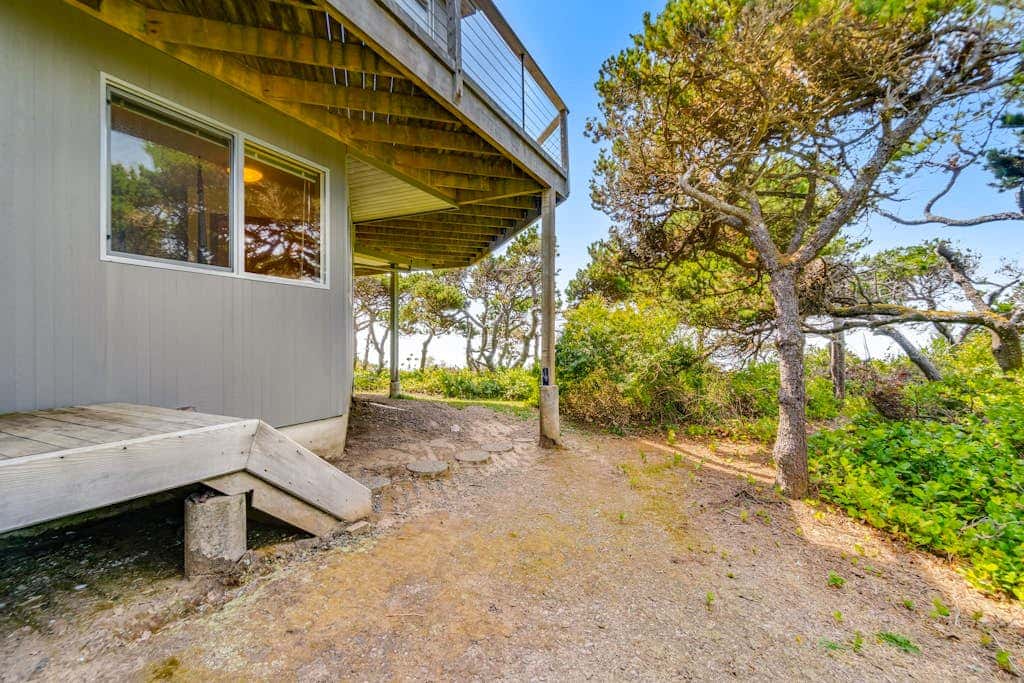 Spacious oceanfront home with free WiFi, and wrap-around deck