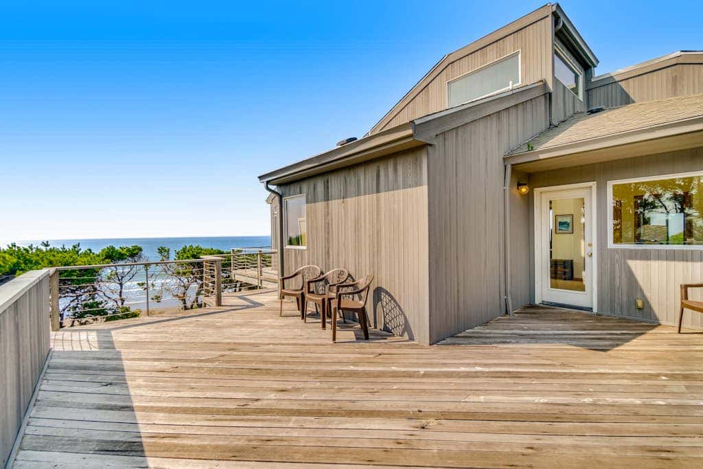 Spacious oceanfront home with free WiFi, and wrap-around deck