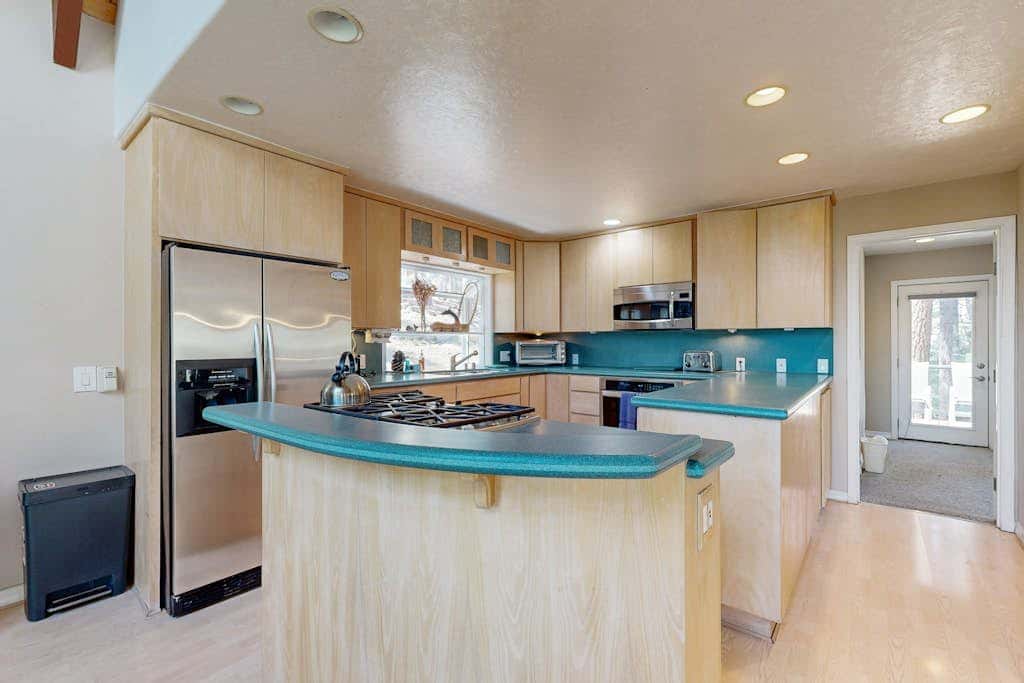 with private, scenic deck, heated driveway